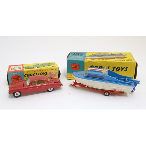 701 - Toys: Two die cast scale model boat and car Corgi Toys to include a Dolphin 20 Cruiser on Wincheon T... 