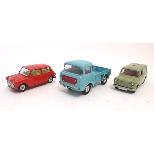 702 - Toys: Three Corgi Toys die cast scale model vehicles / cars, comprising Forward Control Jeep FC-150,... 