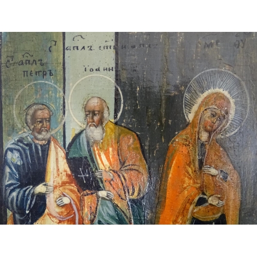 806 - An early 20thC Russian religious icon painted on panel depicting Mary attended by four saints, with ... 