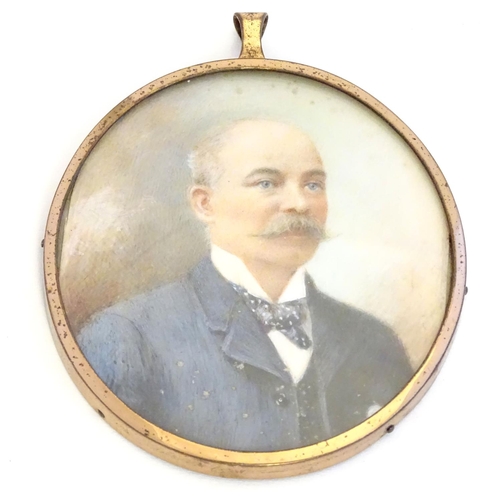 816 - A late 19th / early 20thC oval watercolour and bodycolour portrait miniature depicting a gentleman w... 