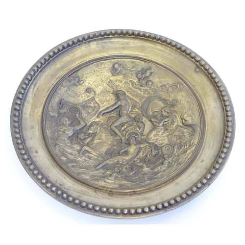 822 - A cast decorative plate depicting the triumph of the sea god Neptune in his chariot with mermaid and... 