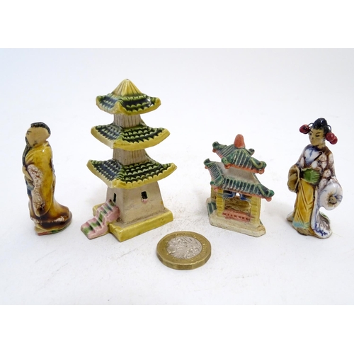 838 - Four French hand painted ceramic items inspired by Japanese culture comprising two pagoda buildings,... 