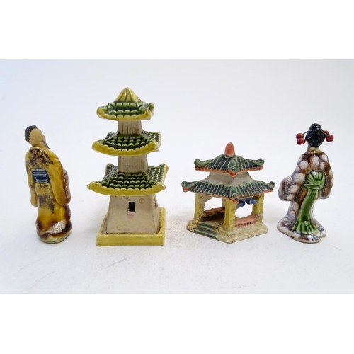 838 - Four French hand painted ceramic items inspired by Japanese culture comprising two pagoda buildings,... 