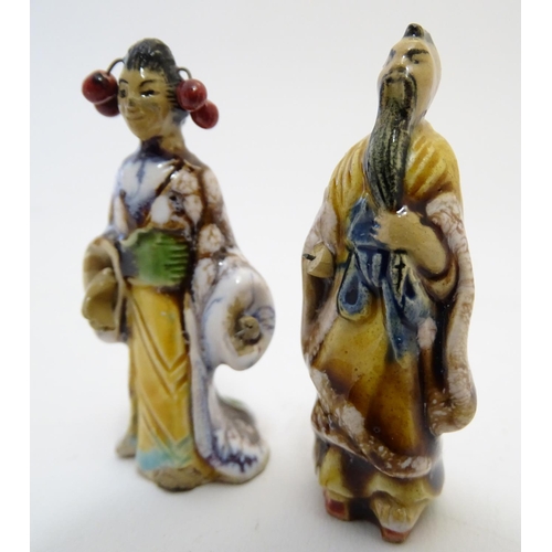 838 - Four French hand painted ceramic items inspired by Japanese culture comprising two pagoda buildings,... 