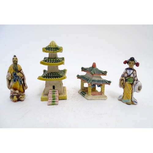 838 - Four French hand painted ceramic items inspired by Japanese culture comprising two pagoda buildings,... 