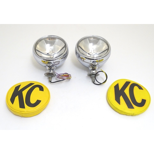 943 - A pair of KC Hilites chromium automotive spotlights with covers, each 6