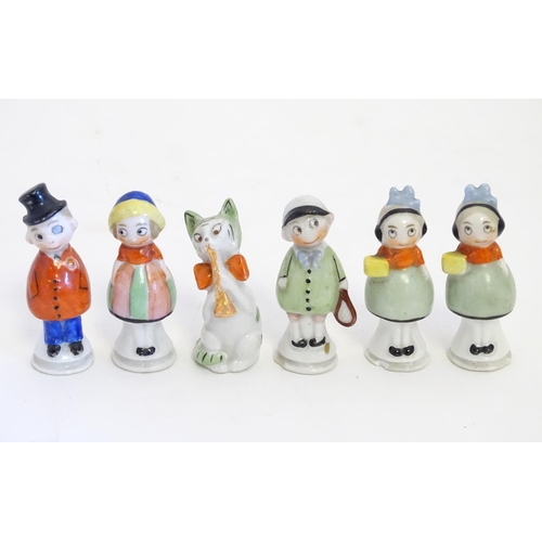 995 - Six early 20thC / Art Deco novelty ceramic figures, one formed as a tennis player, one formed as a c... 