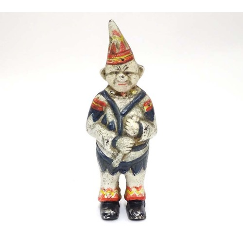 996 - A 21stC cast money box formed as a clown with polychrome decoration. Approx. 5 1/2