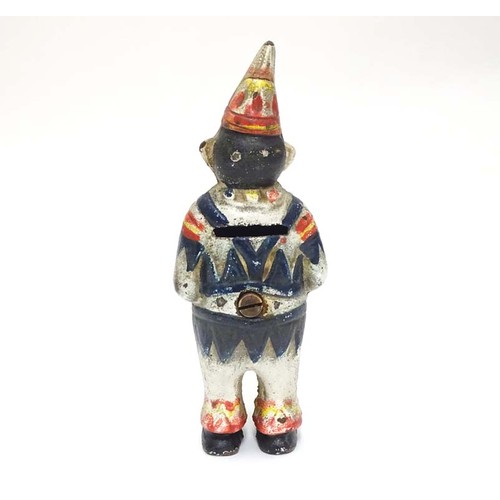 996 - A 21stC cast money box formed as a clown with polychrome decoration. Approx. 5 1/2