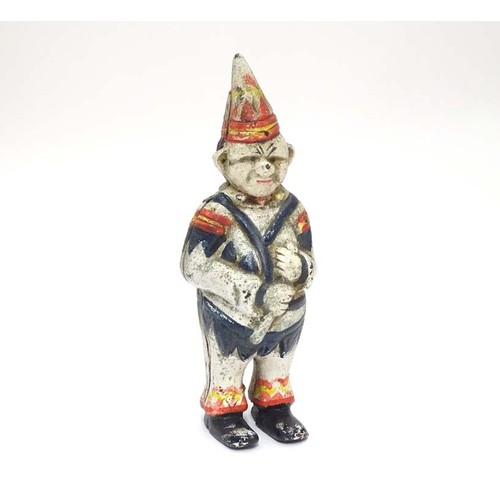 996 - A 21stC cast money box formed as a clown with polychrome decoration. Approx. 5 1/2