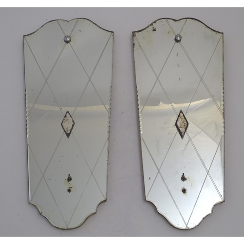 1063 - A pair of 20thC mirrored reflector sections for use with a girandole. 10 1/2