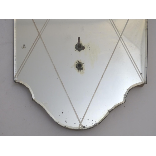 1063 - A pair of 20thC mirrored reflector sections for use with a girandole. 10 1/2