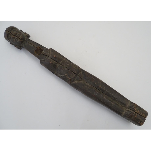 1103 - Ethnographic / Native / Tribal: An African carved hardwood figure depicting an elongated woman stand... 