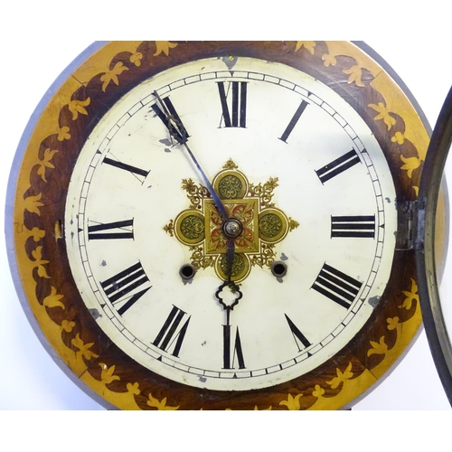 1185 - An American early 20thC 8-day drop dial wall clock, the case decorated with rosewood and boxwood mar... 