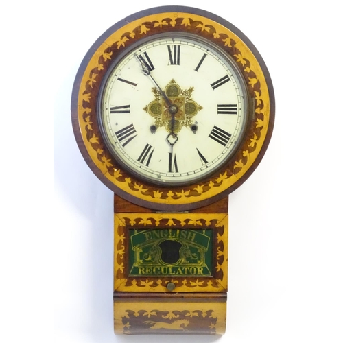 1185 - An American early 20thC 8-day drop dial wall clock, the case decorated with rosewood and boxwood mar... 