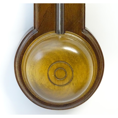 1187 - A mid 20thC stick barometer, the plate marked ' Comitti, Holborn', mahogany case with brass finials.... 