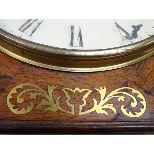 1190 - A Regency wall clock, the octagonal shaped rosewood case with inlaid brass detail and having a fusee... 