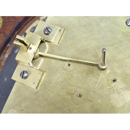 1190 - A Regency wall clock, the octagonal shaped rosewood case with inlaid brass detail and having a fusee... 