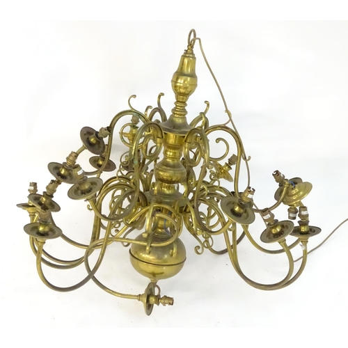 1206 - A mid to late 20thC two-tier pendant electrolier, with eighteen lights over two tiers, 36