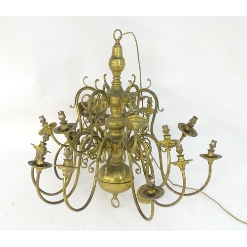 1206 - A mid to late 20thC two-tier pendant electrolier, with eighteen lights over two tiers, 36