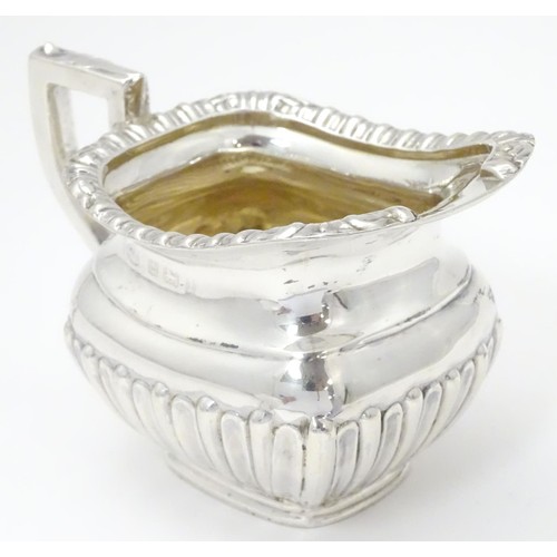 192 - A silver cream jug, hallmarked Birmingham 1910, maker William Aitken. Approx. 2 3/4