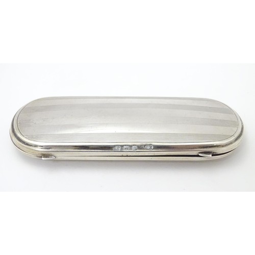 223 - A silver spectacle / glasses case with engine turned decoration. hallmarked Birmingham 1921 maker E ... 