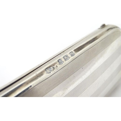 223 - A silver spectacle / glasses case with engine turned decoration. hallmarked Birmingham 1921 maker E ... 