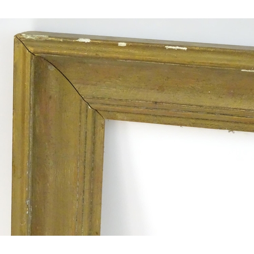 1689 - A gilt and gesso moulded picture frame. Approx. 28 1/4