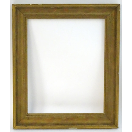 1689 - A gilt and gesso moulded picture frame. Approx. 28 1/4