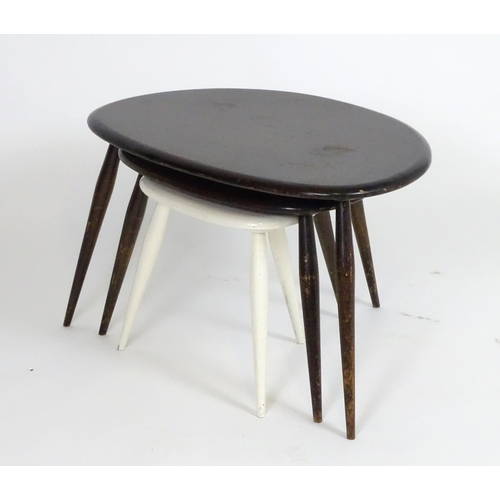 1229 - Vintage Retro, Mid Century: an Ercol nest of 'Mushroom' tables, of elm and beech construction, one w... 