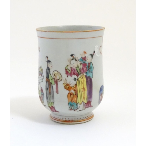 3 - A Chinese export famille rose mug / tankard decorated with figures in a domestic interior scene, and... 