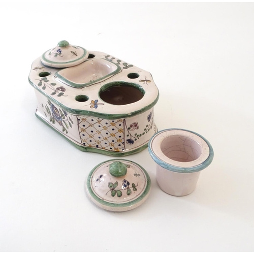 49 - A Continental faience standish with two lidded inkwells and floral and foliate detail. Approx. 3 1/4... 