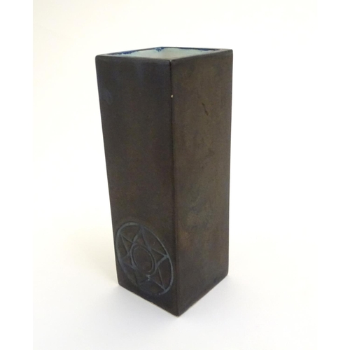 65 - A Troika vase of square form with incised six point star detail. Approx. 4 1/4