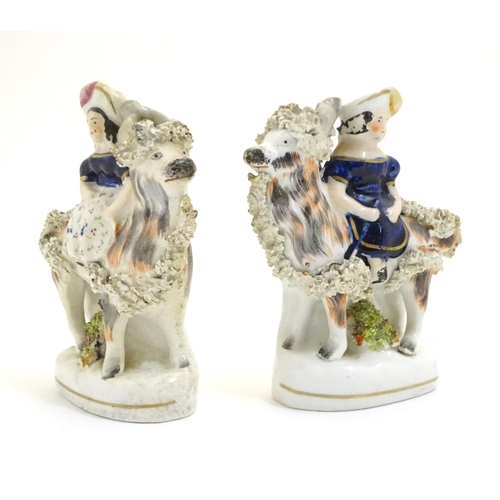 67 - A pair of Staffordshire figures modelled as Queen Victoria‘s children, the Princess Royal and the Pr... 