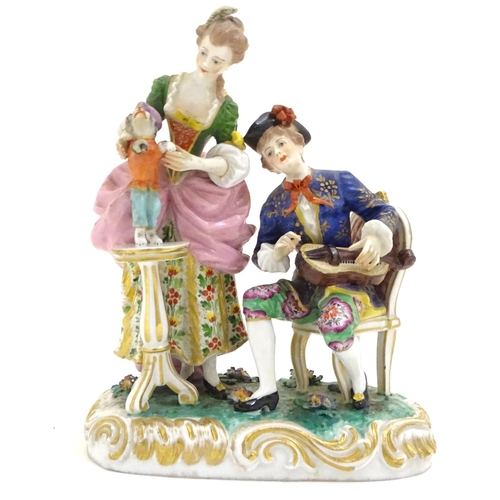 77 - A Continental porcelain figural group depicting a seated man playing a musical instrument and a lady... 