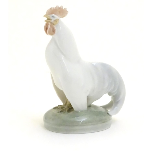 86 - A Royal Copenhagen porcelain model of standing Cockerel. Marked under. Approx. 4 1/4