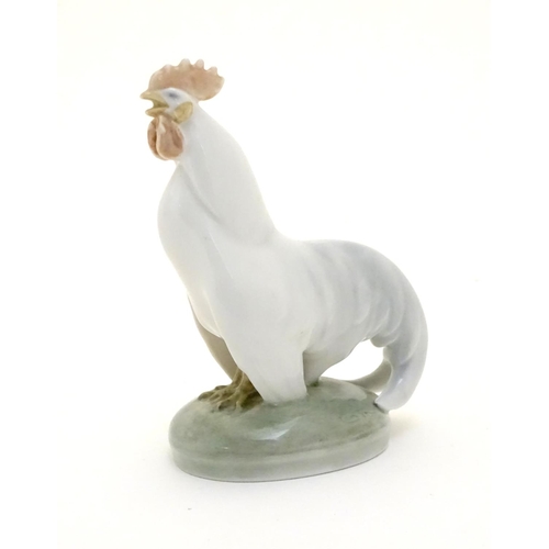 86 - A Royal Copenhagen porcelain model of standing Cockerel. Marked under. Approx. 4 1/4