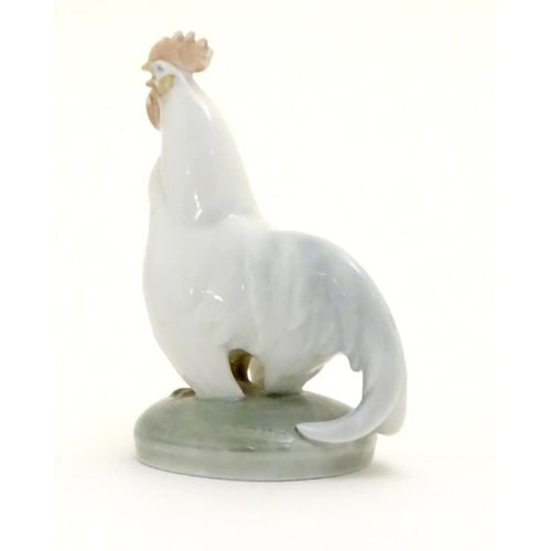 86 - A Royal Copenhagen porcelain model of standing Cockerel. Marked under. Approx. 4 1/4