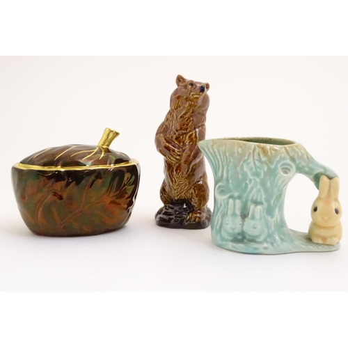 89 - Three assorted ceramic items comprising a novelty Beneagles Scotch Whisky decanter modelled as a sta... 