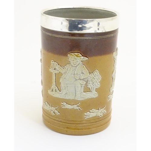 93 - A Royal Doulton salt glaze two tone tankard with a silver rim hallmarked Sheffield 1909, maker Lee &... 