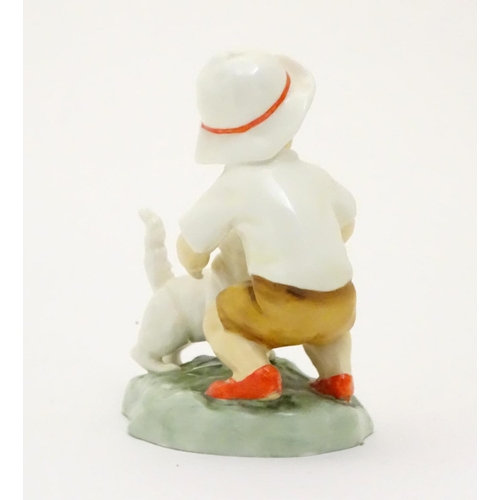 103 - A Royal Worcester figure, Snowy, modelled as a child with a white cat . Marked under with title, mod... 