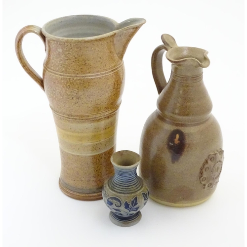 117 - Two items of studio pottery to include a John Chipperfield stoneware jug, marked under, and a stonew... 