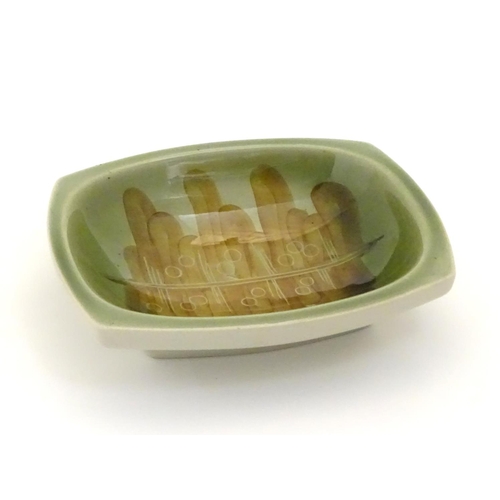 119 - A Ditmar Urbach slipware bowl with hand painted green and brown abstract detail. Marked under and im... 