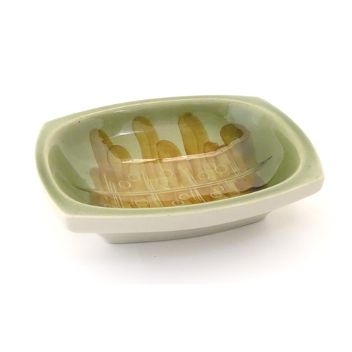 119 - A Ditmar Urbach slipware bowl with hand painted green and brown abstract detail. Marked under and im... 