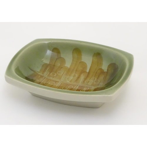 119 - A Ditmar Urbach slipware bowl with hand painted green and brown abstract detail. Marked under and im... 