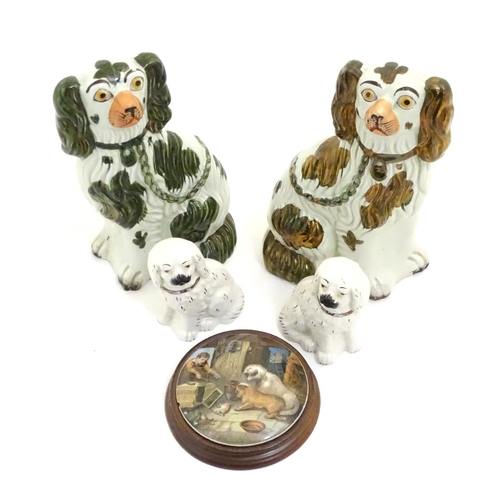 121 - A Victorian Prattware pot lid Both Alike, depicting with two dogs. Together with two pairs of Staffo... 