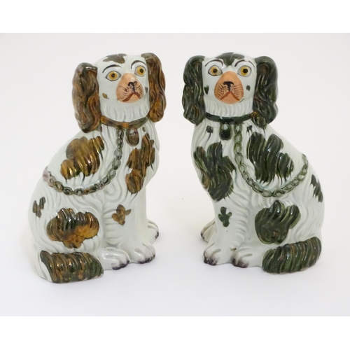 121 - A Victorian Prattware pot lid Both Alike, depicting with two dogs. Together with two pairs of Staffo... 