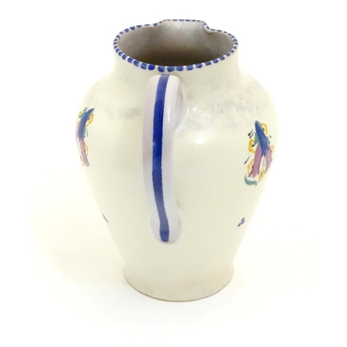 122 - A Carter Stabler Adams jug with hand painted floral detail, marked under for 1921. Together with a P... 