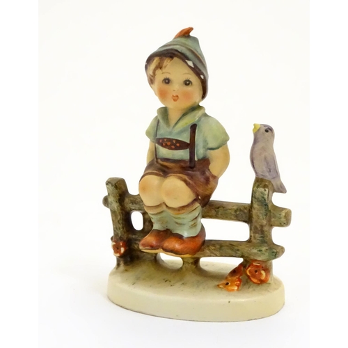 127 - A collection of seven vintage Hummel figurines, comprising #47 Goose Girl, #58/0 Playmates, #63 Sing... 