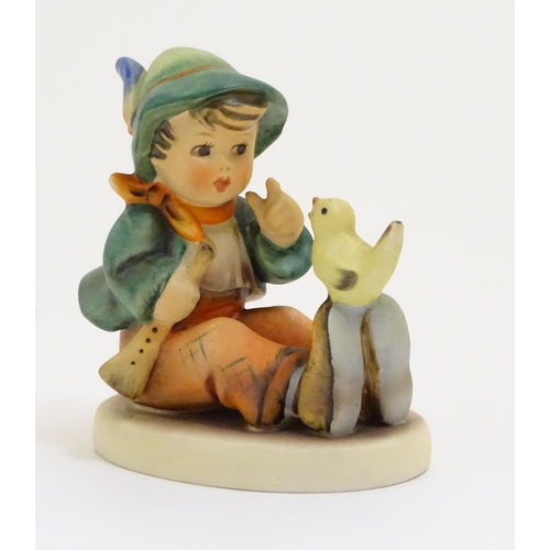 127 - A collection of seven vintage Hummel figurines, comprising #47 Goose Girl, #58/0 Playmates, #63 Sing... 